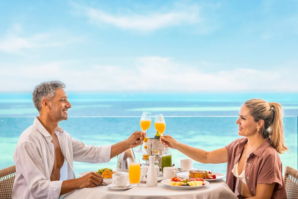 couple having breakfast at their suite