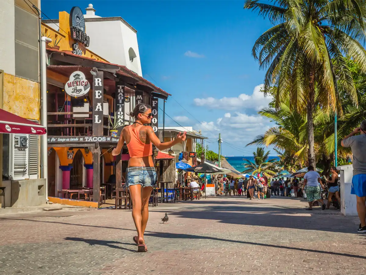 Young girl shopping at local stores near the beach in Cancun